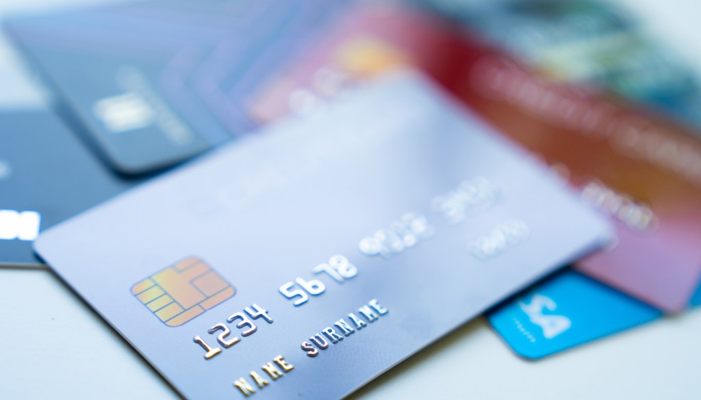A traveler contemplating about using a debit card abroad