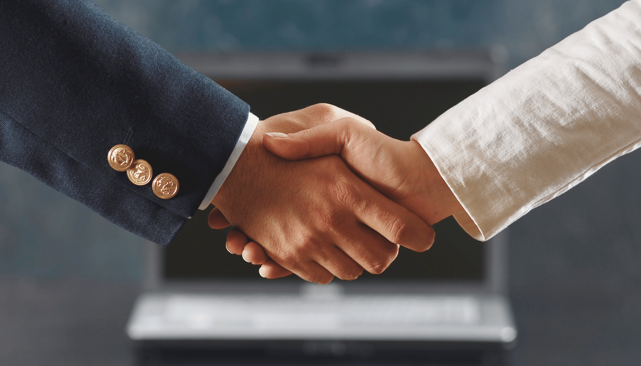 a handshake representing a business transaction
