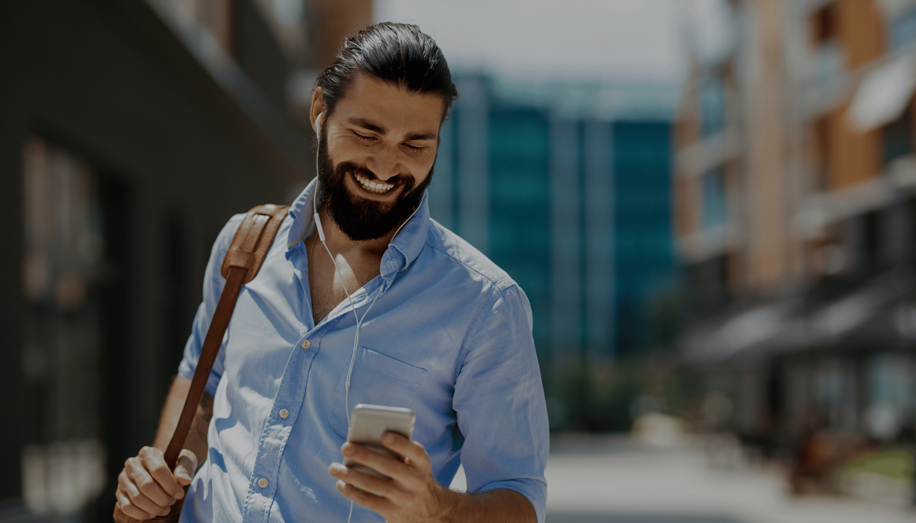 Man using mobile for money transfers.